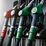 Different row of fuel pistols in auto service