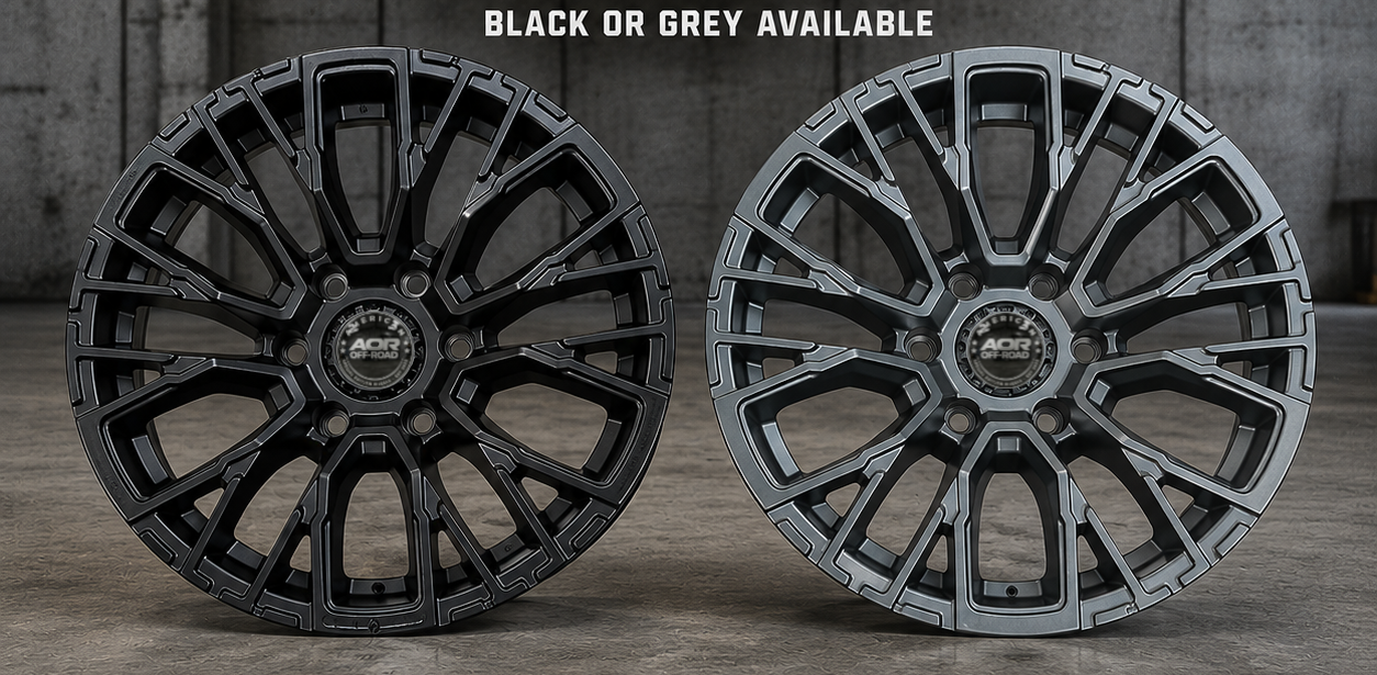 Two 17" American Offroad Bakkie Wheels. One in Black on the left and one in Grey on the right